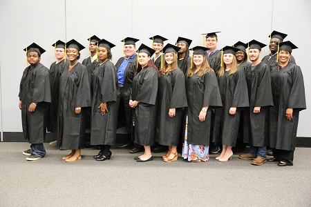 Seventeen of the 21 adult basic education students in East Mississippi Community College’s Adult Basic Education Launch Pad program who earned their high school equivalency diplomas participated in a graduation ceremony the night of Thursday, June 14. Seventeen of the 21 adult basic education students in East Mississippi Community College’s Adult Basic Education Launch Pad program who earned their high school equivalency diplomas participated in a graduation ceremony the night of Thursday, June 14.
