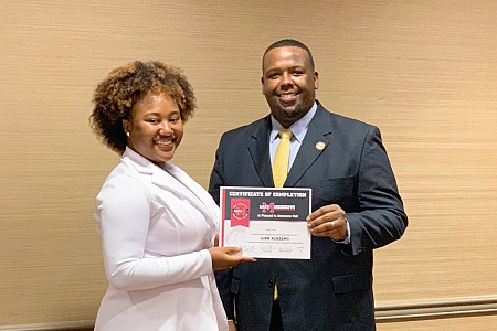 East Mississippi Community College Lion Academy graduate Sage Love, at left, is presented a certificate of completion by EMCC Associate Dean of Instruction James Rush. East Mississippi Community College Lion Academy graduate Sage Love, at left, is presented a certificate of completion by EMCC Associate Dean of Instruction James Rush.